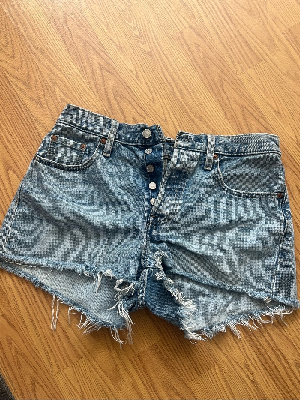 Levi's Light Blue Button-Front Distressed Denim Shorts